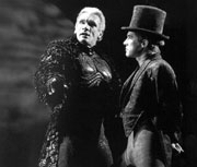 Puck (Don Donohue, left) talks folly in the forest with Oberon (Brent Harris).