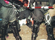 Too little, too late? Police were criticized for holding back on Tuesday night.
