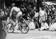A nude biker pedals to his workout class.