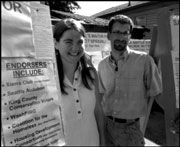 Water signs: Yes For Seattle's Pam Johnson and Knoll Lowney want your signature.