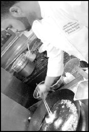 Anthony Hubbard, 25 and cooking.