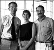 Their last laugh? The Alliance's Tony Lee, Laura Wells, and Steve Daschle (left to right) want to preserve King County's human services.