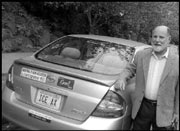 Adam Kline with his hybrid car.