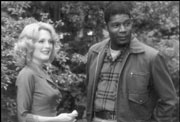 Moore and her always handy, always understanding gardener Haysbert.