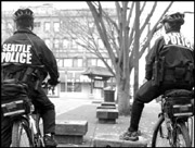 Cops earning extra money in the International District.