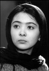 Bahrami sheds her work clothes but not her reserve.