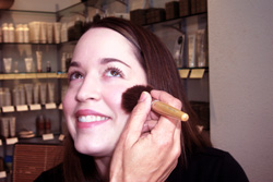 An artist works on Erin.