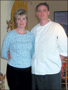 Genes Palmer and Maddrey stand shoulder to shoulder.