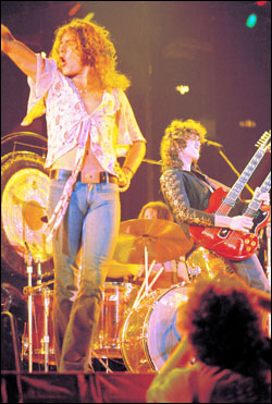 Praying mantis in fright wig (left), studio-obsessed genius-hack.