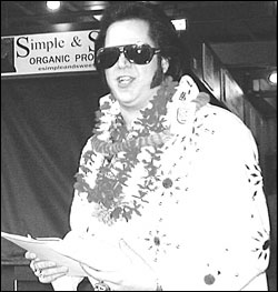 That would have to be in the back seat of CAB ELVIS,