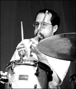 Hollenbeck blowing the hog caller during an August show at Tonic.