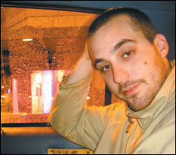 On his way up: Lalario cabs it downtown.