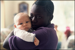 Refugee Martha baby-sits.