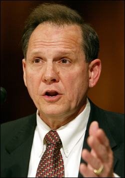 Roy Moore, with Bible, on Capitol Hill last month.