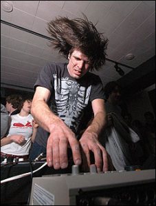 Wolf Eyes' Nate Young speaks with his hands.