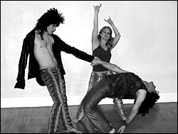 Cardiff (center) and the boys revel on the highway to hell.