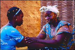 Daughter Traor&eacute; (left) draws strength from mother Coulibaly.