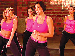 Murphy (center) swivels toward self-esteem in her instructional video.