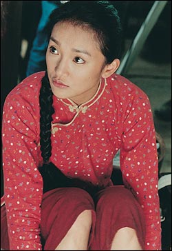 Seamstress Xun Zhou.