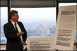 Assistant city attorney Sean Sheehan parses the mayoral mailing for the ethics board.