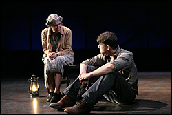 Ma (Beth Dixon) and Tom Joad (Erick Kastel) share an Intiman moment.