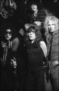 Kane (at right) in the Dolls' prime.