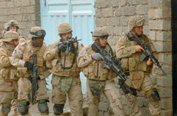 Preparing to enter a building during a combat patrol in Tall Afar, Feb. 7. These soldiers are attached to the U.S. Army's 3rd Armored Cavalry Regiment.