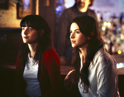 Deschanel (left) with Warner.