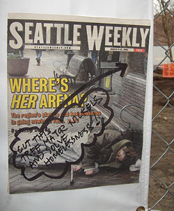 A reader uses a Weekly cover to comment on the logging of Occidental Park in Pioneer Square.