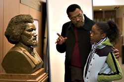 Fishburne teaches Palmer her history.