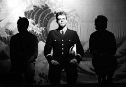 Spark me up: Tommy Smith as Lt. "Sparky" Watts, who sets hearts aflame in Far East.