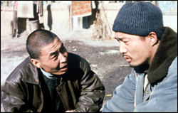 Wang (left) and Li conspire.