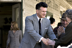 Penn presses the flesh like a man twice his size.