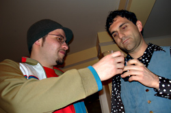 McGuigan (left), toasts literature.