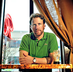 A lover of alligator shirts, stubble, and beer, Red Door owner Pete Hanning doesn't want to be penalized for calling 911.