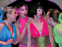 Doing their jobs with relish: the ladies of Lysistrata.