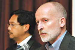 Burgess (right) counted his Alki Foundation chickens before they hatched.