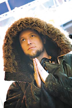 Colin Johnson: boy in a hood.