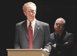 R. Hamilton Wright as Bush, with Michael Winters as Cheney in the shadows.