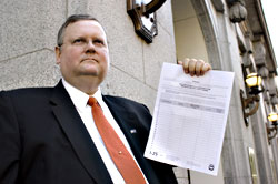 Campaign spokesperson Toby Nixon wants an elected director of elections, doesnt want to look right at the camera.