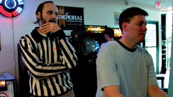 Wiebe (right) stalked by judge Walter Day.