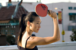 Maggie Q prepares her best shot.