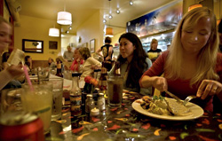 She doesnt really need a knife to cut that steak.