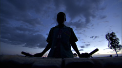 One of the dancers rehearses at sunset.