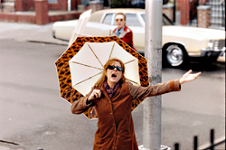 Sarandon breaks into song.