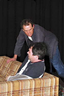 Reed (standing) as Marcus: ready to box.