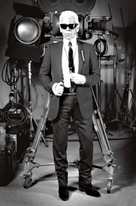 Dont touch his rings! Dont touch his majestic white ponytail! Karl Lagerfeld hates you, because you are ugly and fat.