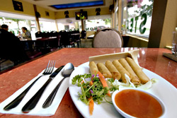 Bet youve never had lumpia garnished with bamboo and parsley sprigs.