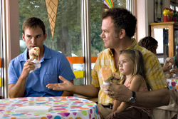 For the sake of his family, Reilly (right) will dick over Scott.