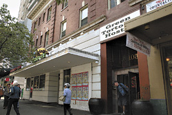 A sprinkler accident has put the Green Tortoise at odds with its downstairs neighbor.